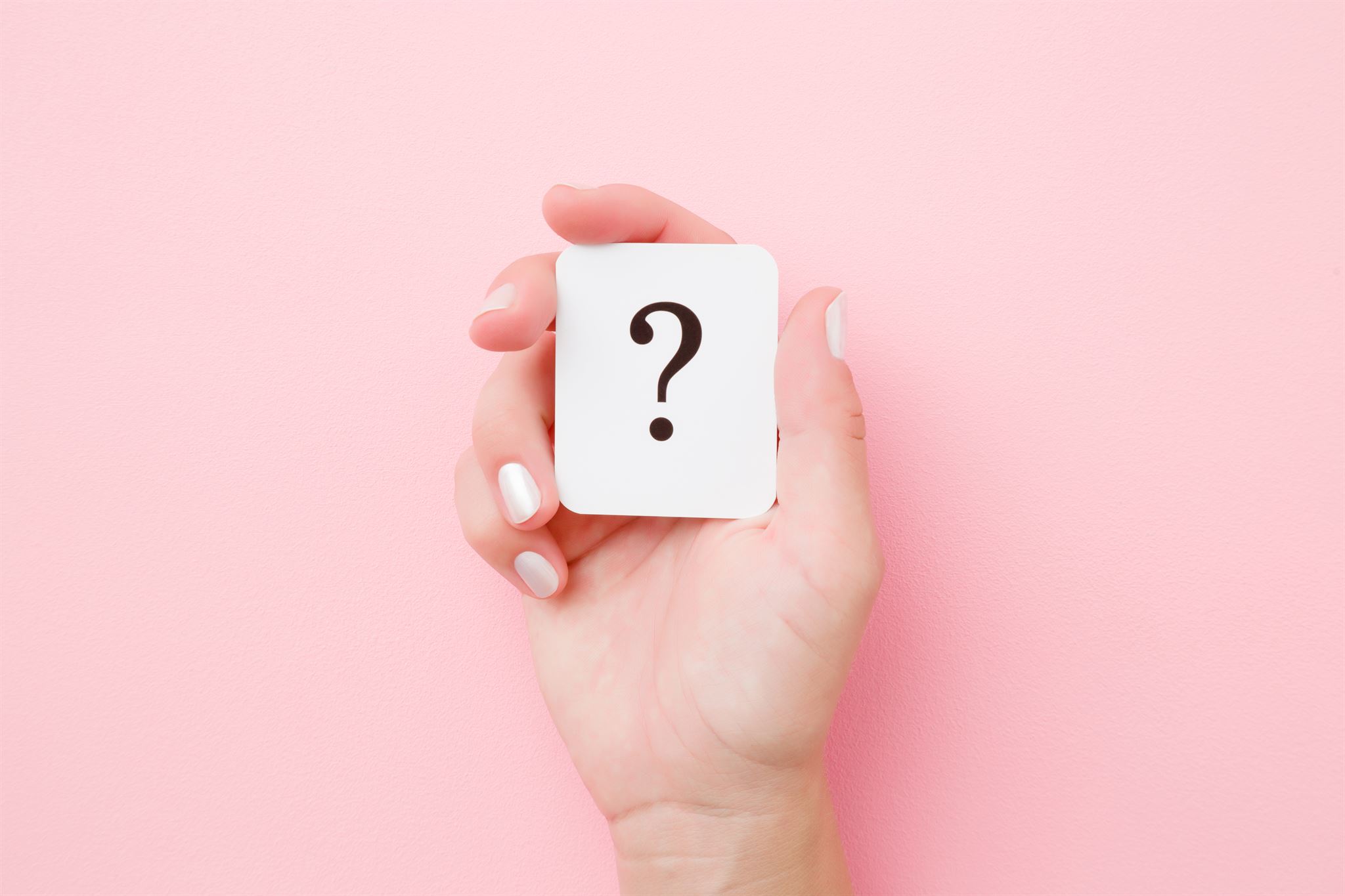 Person-holding-car-with-question-mark